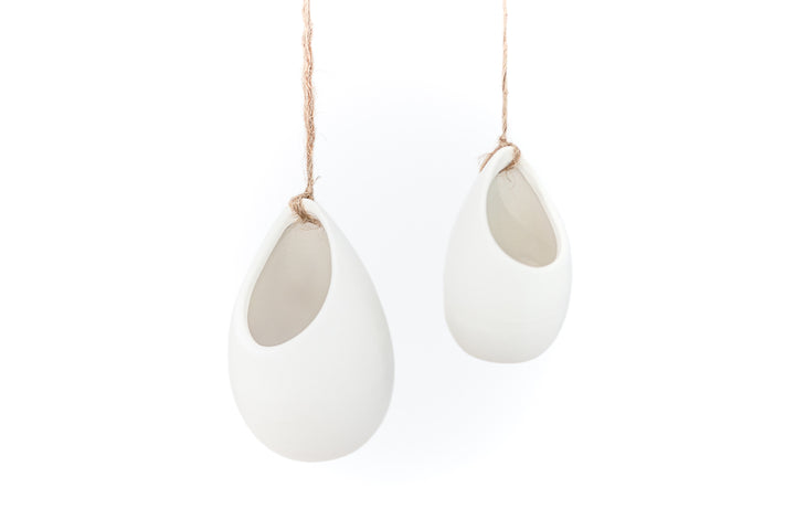2 large ivory ceramic vases hanging from hemp string