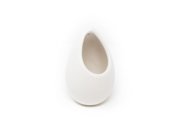 small ivory ceramic vase